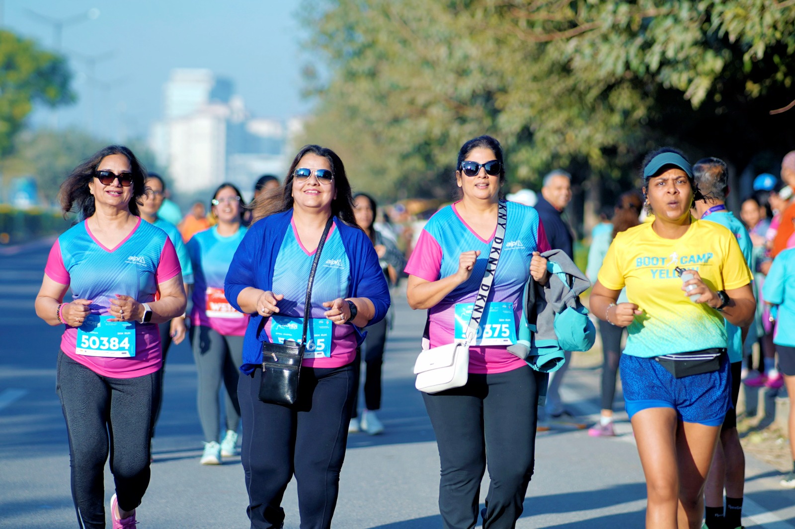 Women running at sunrise